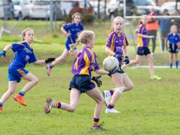 Kilmacud Crokes Under 12 Ladies Footballers at Carryduff GAA blitz in Belfast on 25th of August