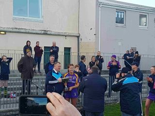 Senior Camogie Team beat Faughs after replay to win Senior 3 Championship Final