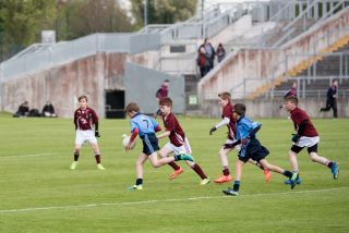 U12 Footballers Play at Half time in All Ireland U21 Football Final