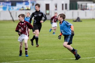 U12 Footballers Play at Half time in All Ireland U21 Football Final