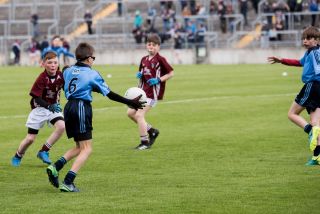 U12 Footballers Play at Half time in All Ireland U21 Football Final
