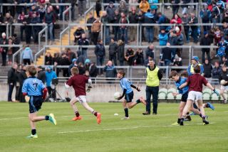 U12 Footballers Play at Half time in All Ireland U21 Football Final