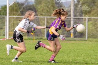 Kilmacud Crokes Under 12 Ladies Footballers at Carryduff GAA blitz in Belfast on 25th of August