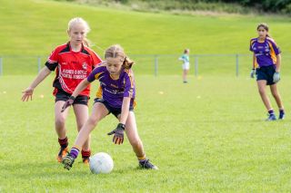 Kilmacud Crokes Under 12 Ladies Footballers at Carryduff GAA blitz in Belfast on 25th of August