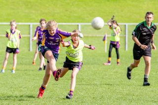 Kilmacud Crokes Under 12 Ladies Footballers at Carryduff GAA blitz in Belfast on 25th of August