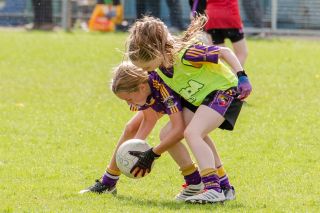 Kilmacud Crokes Under 12 Ladies Footballers at Carryduff GAA blitz in Belfast on 25th of August