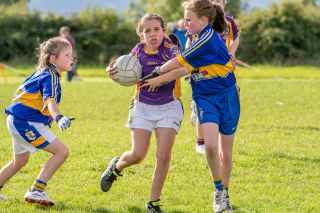 Kilmacud Crokes Under 12 Ladies Footballers at Carryduff GAA blitz in Belfast on 25th of August