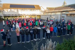 Kilmacud Crokes County Champions Footballers and Hurlers Visit Scoil San Treasa