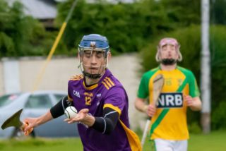Crokes beat Faughs in torrential rain
