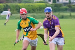 Crokes beat Faughs in torrential rain