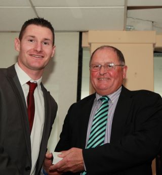 Senior medal presentation by Sean Shanley to Eoin Dalton