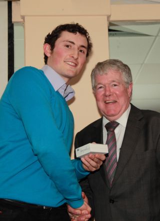 Senior Team presentation by Ross O'Carroll to Richie Stakelum