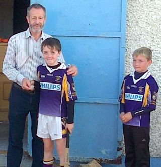 Crokes players with Sean Kelly