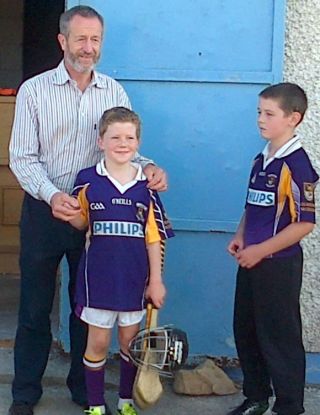 Crokes players with Sean Kelly