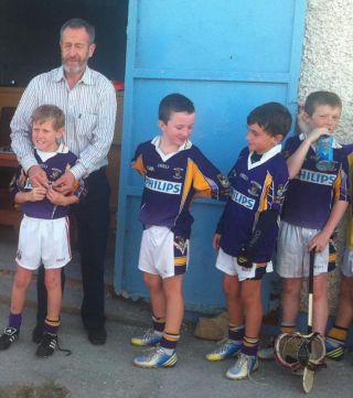 Crokes players with Sean Kelly