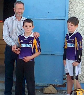 Crokes players with Sean Kelly