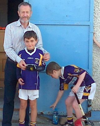 Crokes players with Sean Kelly
